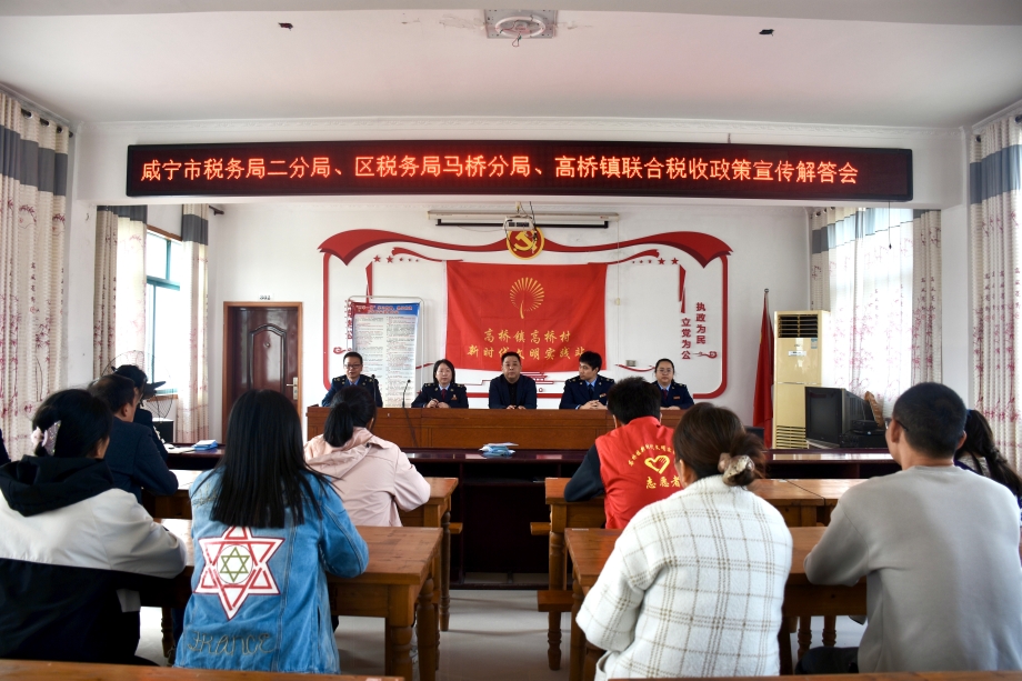 图为解答会现场.jpg 图为解答会现场.jpg